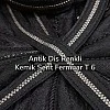 Antik diş rengi ve kemik şeridi ile zarif fermuar, her türlü tasarım için ideal.