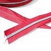 Vibrant red durable nickel-toothed #3 zipper, offering both style and functionality.