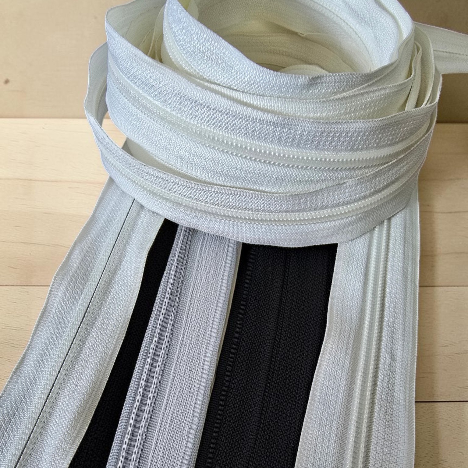 Durable #5 nylon tape zipper, suitable for various applications.