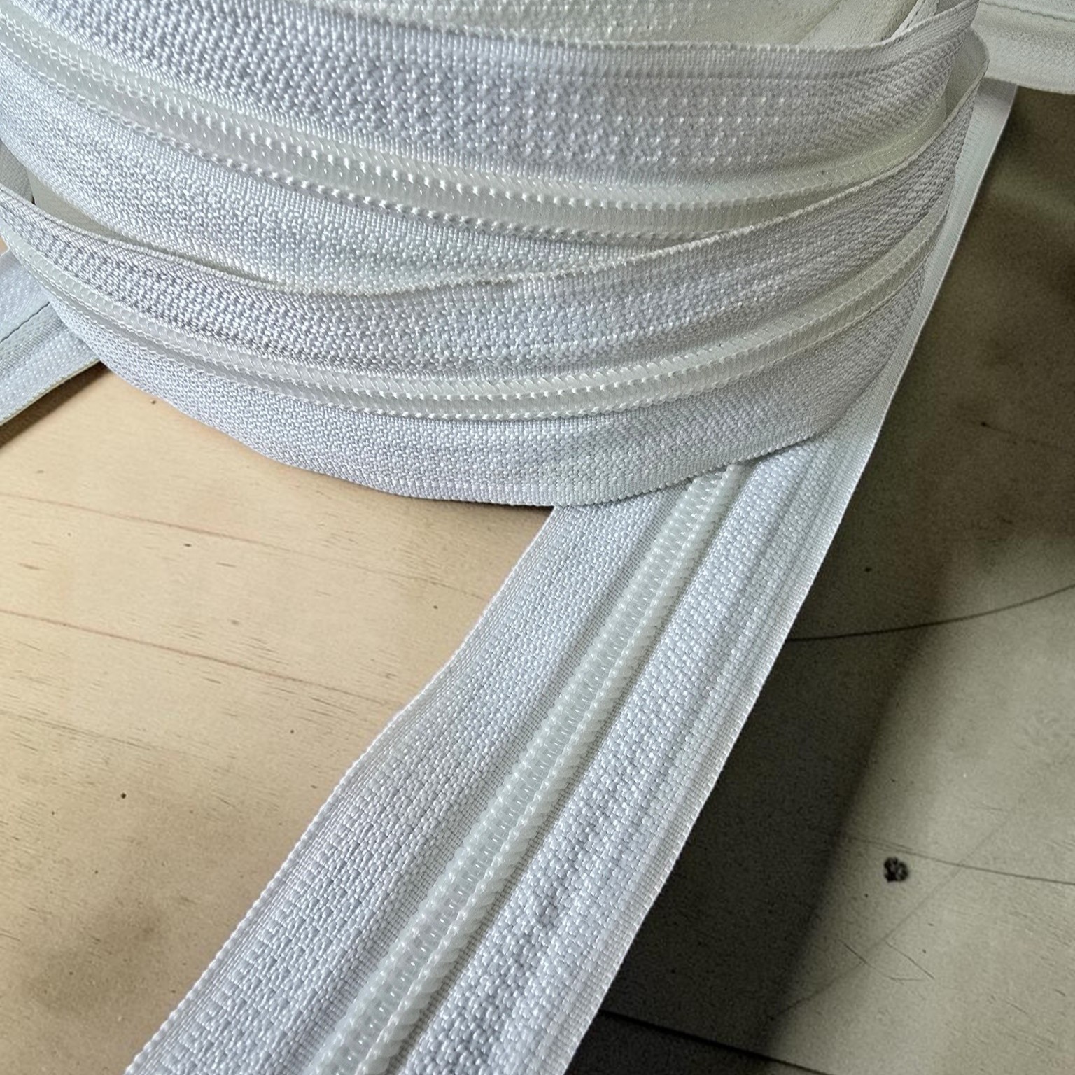 Durable #5 nylon tape zipper, suitable for various applications.