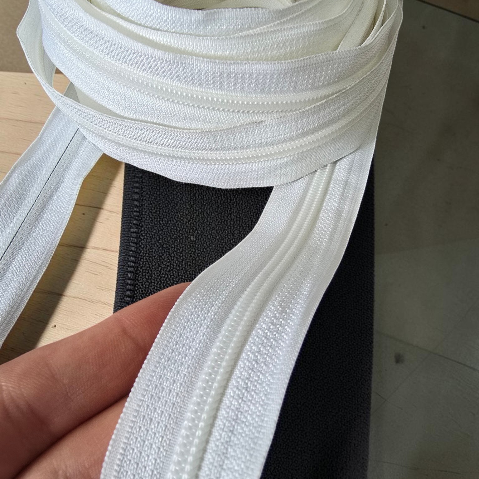 Durable #5 nylon tape zipper, suitable for various applications.
