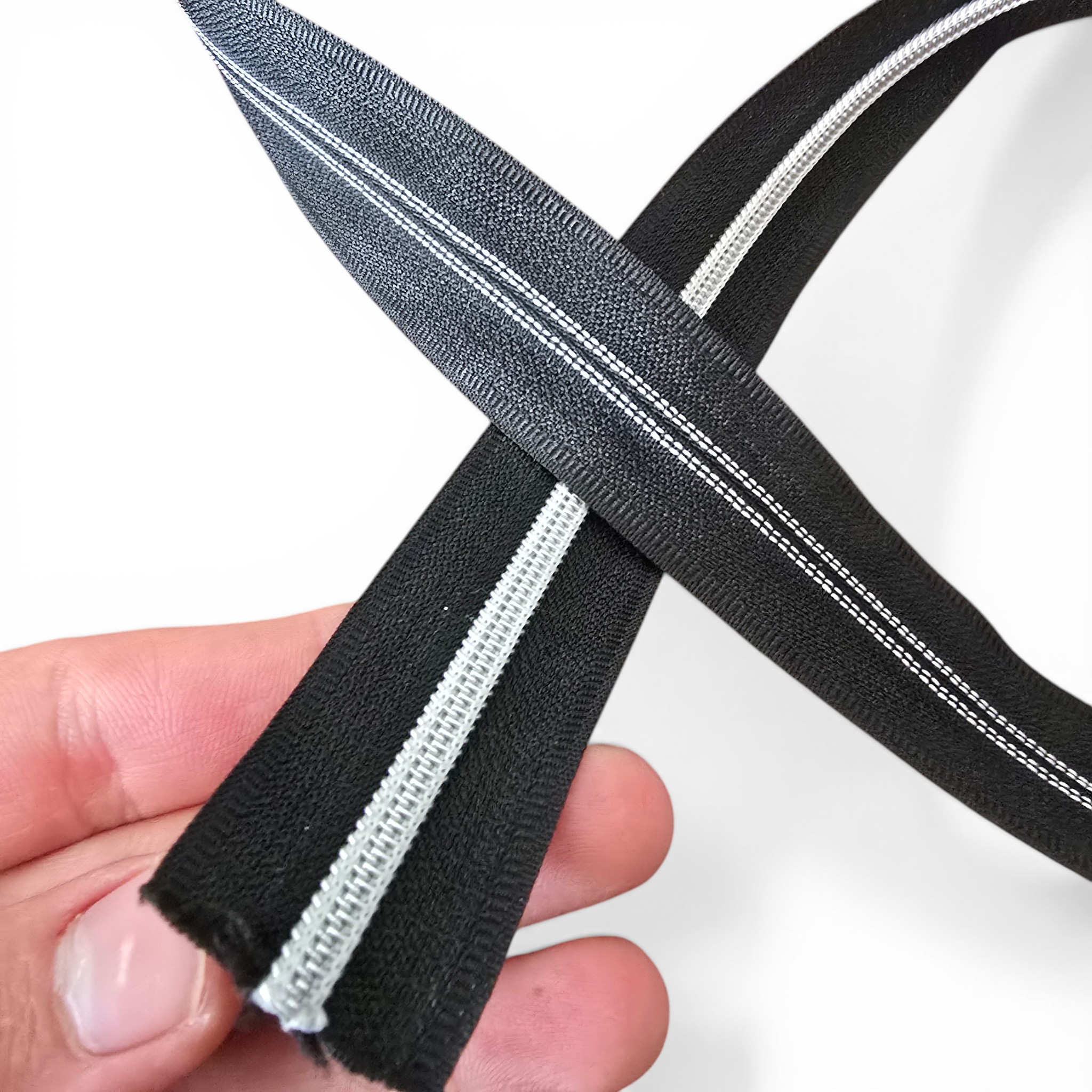 Silver-toothed nylon zipper with coloured tape #3, offering both style and durability.